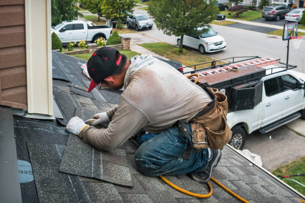 Professional Storm Damage Roof Repair technician working in West Haven, CT